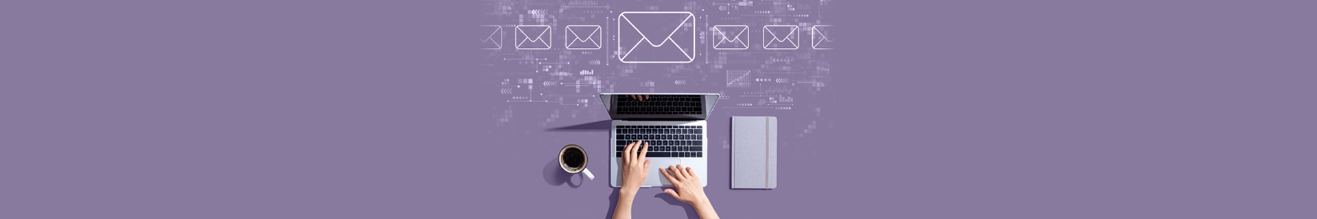 A laptop with email icons
